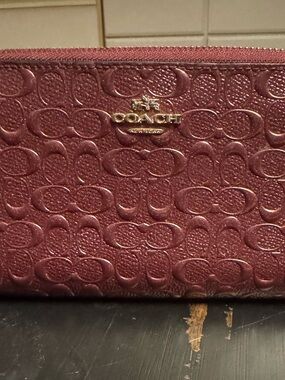 Coach Embossed Leather Zip Wallet in Wine